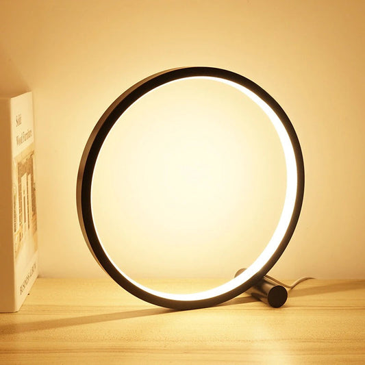 Circular touch-sensitive bedside lamp